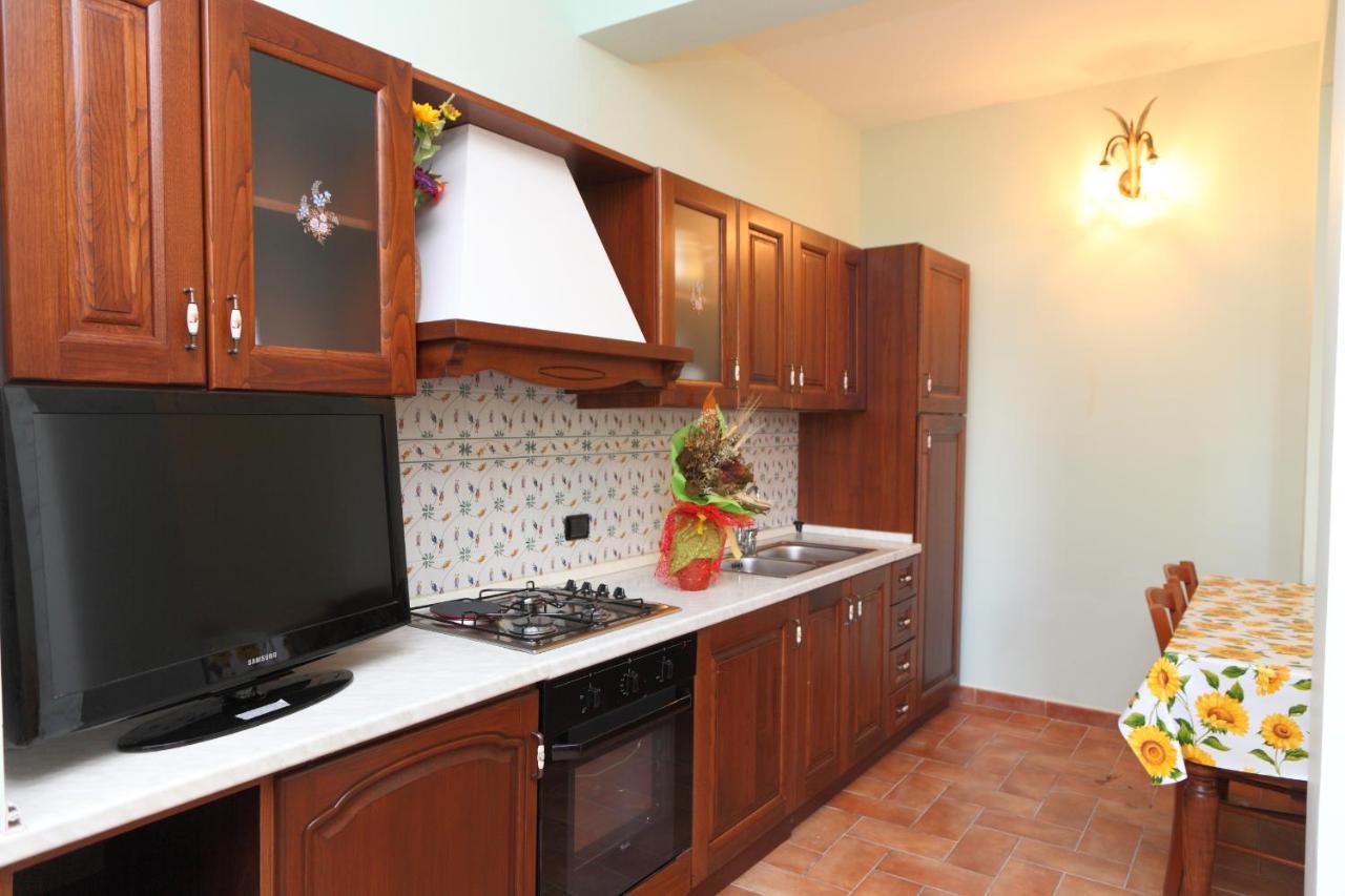 Sikelios Apartments Чефалу Экстерьер фото